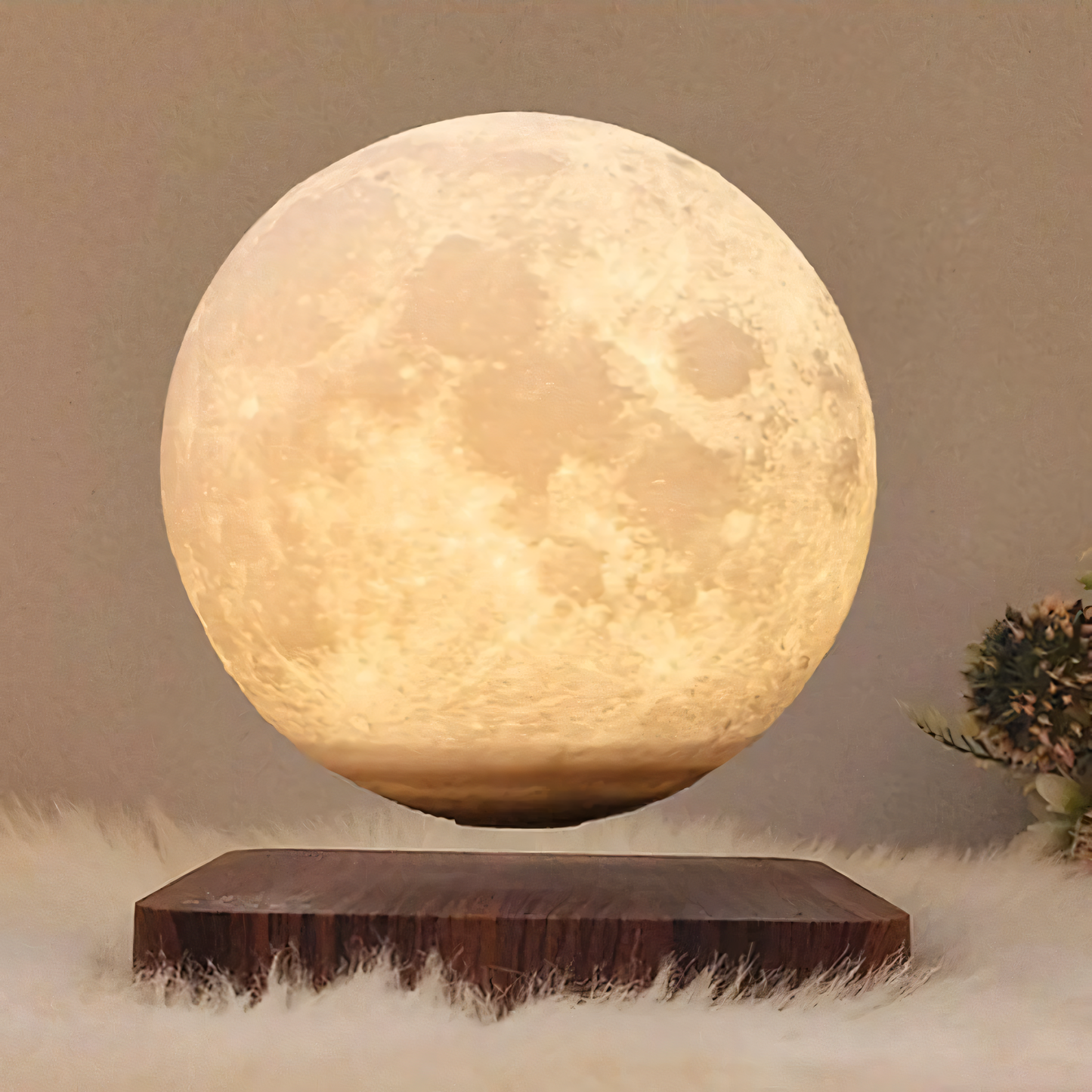 StripX Levitating Moon Lamp floating above base